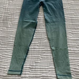 Pink seamless laser cut detail leggings ombré blue teal